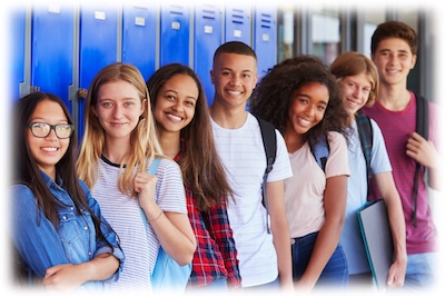 School kids leaning against lockers